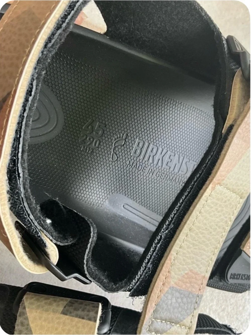 Birkenstock Men’s Black Slides with Tan Accent Strap